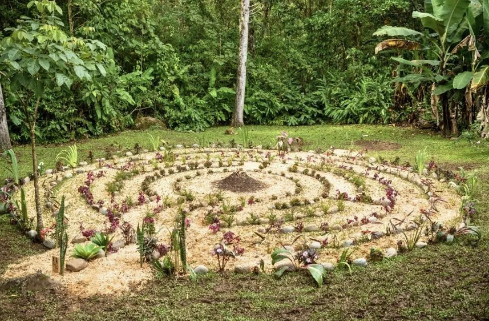 Sacred stone labyrinth in the forest