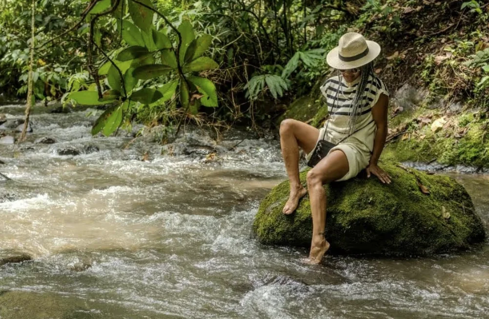 Njeri Njuhigu by the river